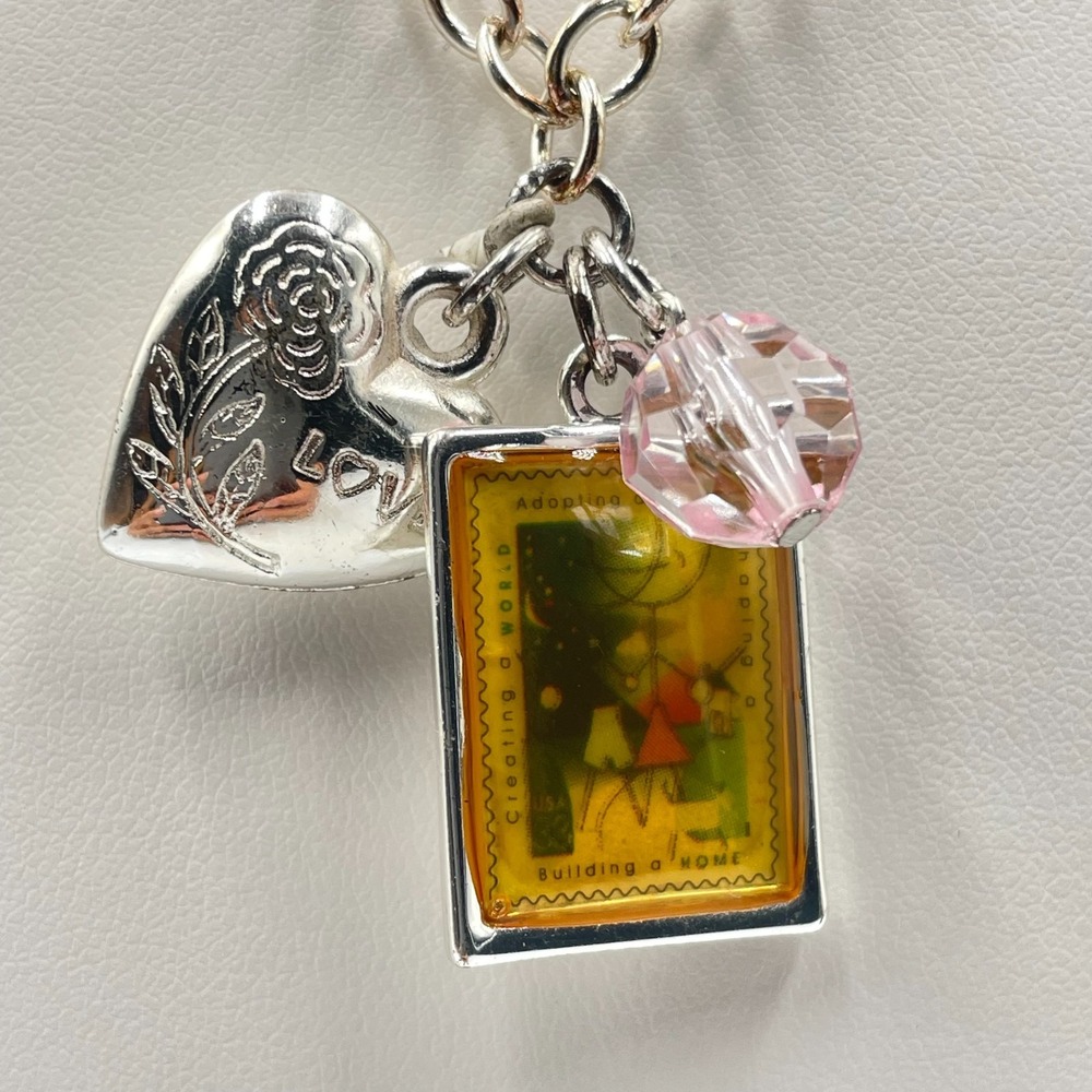 Vintage Silver Tone Adopting a Child Stamp Heart Love Multi Charm Necklace Y2K